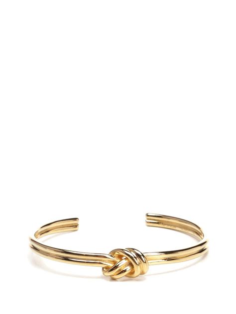 celine gold knot bracelet|Celine double knot bracelet.